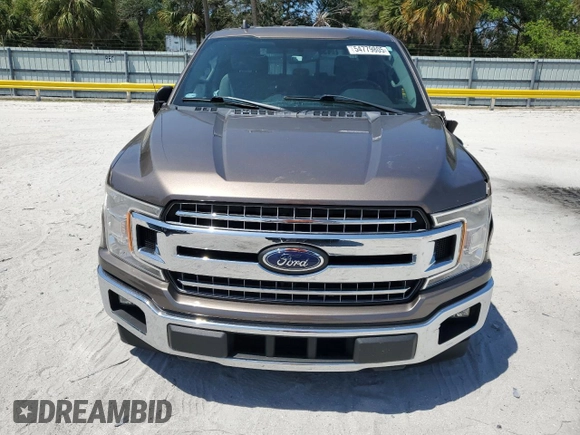 2018 Ford F-150 XL with VIN 1FTEW1CG4JKC38569, listed as a Copart auction lot 54779805 with 97,190 mi miles and Salvage Title. Bid and sale history available at carsss.com. Image 5.