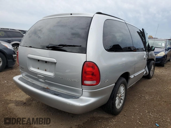 2000 Chrysler Town & Country LX z VIN 1C4GP44G5YB516136, wystawiony jako Copart lot #78693894 z przebiegiem 71 708 mil mil oraz Szkoda całkowita • Salvage title. Historia ofert i sprzedaży dostępna na DreamBid. Obrazek 3.