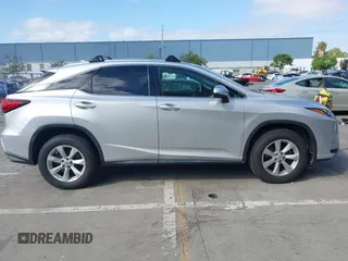 2016 Lexus RX 350 with VIN 2T2BZMCA6GC038564, listed as a IAAI auction lot 42203817 with 140,147 mi miles and . Bid and sale history available at DreamBid. Image 13.