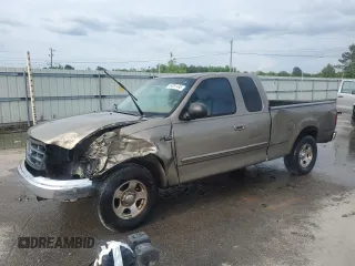 2003 Ford F-150 XL with VIN 1FTRX17LX3NA38576, listed as a Copart auction lot 54057495 with 173,811 mi miles and Salvage title. Bid and sale history available at DreamBid. Image 1.