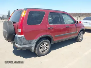 2002 Honda CR-V EX with VIN JHLRD78892C094415, listed as a IAAI auction lot 42406205 with 218,279 mi miles and . Bid and sale history available at DreamBid. Image 4.