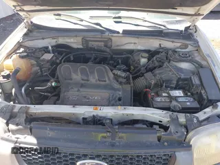 2002 Ford Escape XLS Choice with VIN 1FMYU02132KA46180, listed as a IAAI auction lot 42562178 with 225,404 mi miles and . Bid and sale history available at DreamBid. Image 10.