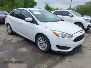 2018 Ford Focus SE z VIN 1FADP3F29JL223389, wystawiony jako IAAI lot #42127707 z przebiegiem 87 145 mil mil oraz . Historia ofert i sprzedaży dostępna na DreamBid. Obrazek 1.