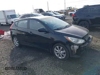 2012 Hyundai Accent SE with VIN KMHCU5AEXCU053645, listed as a IAAI auction lot 41407582 with 118,290 mi miles. Bid and sale history available at carsss.com. Image 1.