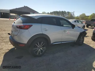 2018 Mazda CX-3 Grand Touring with VIN JM1DKFD77J0310587, listed as a Copart auction lot 49443755 with 70,897 mi miles and Salvage Title. Bid and sale history available at carsss.com. Image 3.