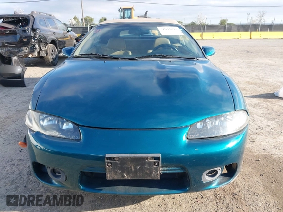 1999 Mitsubishi Eclipse GS-T with VIN 4A3AX55F6XE052978, listed as a IAAI auction lot 41841812 with 92,776 mi miles and . Bid and sale history available at carsss.com. Image 12.