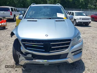 2014 Mercedes-Benz M 350 z VIN 4JGDA5JB1EA322574, wystawiony jako IAAI lot #42295699 z przebiegiem 207 959 mil mil oraz . Historia ofert i sprzedaży dostępna na DreamBid. Obrazek 13.