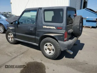 1996 Chevrolet Tracker z VIN 2CNBJ1869T6912380, wystawiony jako Copart lot #68080054 z przebiegiem 175 206 mil mil oraz Szkoda całkowita • Salvage title. Historia ofert i sprzedaży dostępna na DreamBid. Obrazek 2.