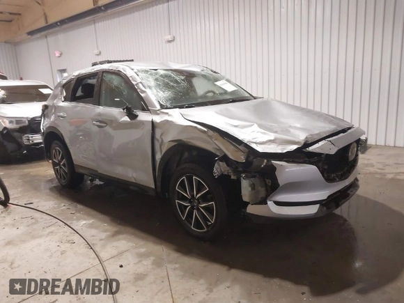 2018 Mazda CX-5 Touring with VIN JM3KFBCM7J0347769, listed as a IAAI auction lot 41611985 with 158,579 mi miles. Bid and sale history available at carsss.com. Image 1.