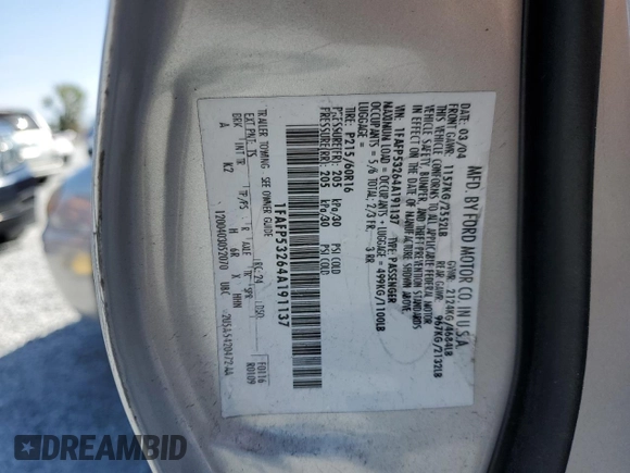 2004 Ford Taurus SE with VIN 1FAFP53264A191137, listed as a Copart auction lot 61438515 with 124,075 mi miles and Non repairable. Bid and sale history available at DreamBid. Image 14.