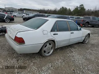 1992 Mercedes-Benz 560 with VIN WDBGA57E7NA068936, listed as a Copart auction lot 85746754 with 132,264 mi miles and Clean Title. Bid and sale history available at DreamBid. Image 3.