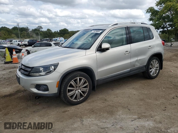 2013 Volkswagen Tiguan SE z VIN WVGBV7AX0DW539618, wystawiony jako Copart lot #71529804 z przebiegiem 148 362 mil mil oraz Szkoda całkowita • Salvage title. Historia ofert i sprzedaży dostępna na DreamBid. Obrazek 1.
