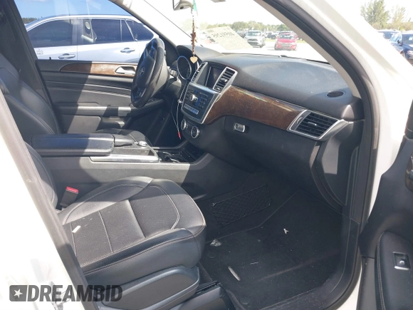 2015 Mercedes-Benz M 350 with VIN 4JGDA5JB9FA590659, listed as a IAAI auction lot 40591295 with 117,825 mi miles and . Bid and sale history available at DreamBid. Image 5.