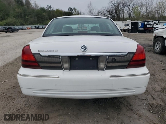 2010 Mercury Grand Marquis LS z VIN 2MEBM7FV2AX606751, wystawiony jako Copart lot #52798295 z przebiegiem 100 616 mil mil oraz Szkody całkowita. Historia ofert i sprzedaży dostępna na DreamBid. Obrazek 6.