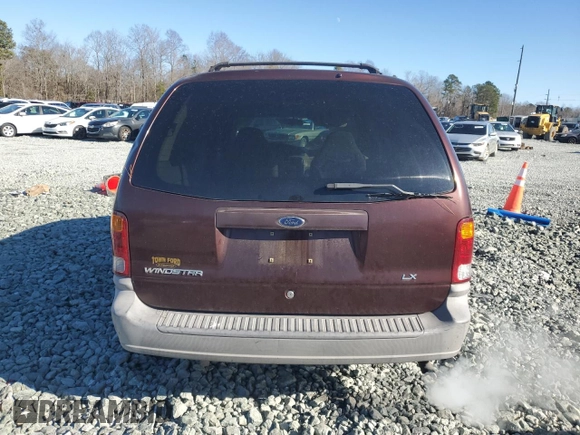 2000 Ford Windstar LX z VIN 2FMZA5145YBA32743, wystawiony jako Copart lot #41564265 z przebiegiem 139 713 mil mil oraz Szkoda całkowita • Salvage title. Historia ofert i sprzedaży dostępna na DreamBid. Obrazek 6.