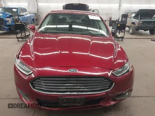 2016 Ford Fusion SE z VIN 1FA6P0H74G5113167, wystawiony jako IAAI lot #41973150 z przebiegiem 192 845 mil mil oraz . Historia ofert i sprzedaży dostępna na DreamBid. Obrazek 13.