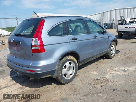 2010 Honda CR-V LX with VIN 3CZRE3H39AG701619, listed as a IAAI auction lot 41986031 with 107,200 mi miles and . Bid and sale history available at DreamBid. Image 4.