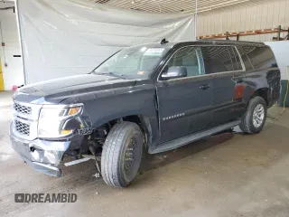 2018 Chevrolet Suburban LS with VIN 1GNSKGEC9JR393340, listed as a Copart auction lot 56316665 with 104,751 mi miles and Salvage title. Bid and sale history available at DreamBid. Image 1.