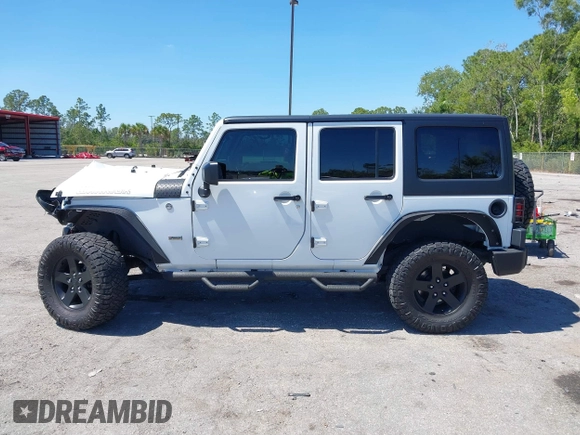 2016 Jeep Wrangler Unlimited Sport with VIN 1C4BJWDG3GL282787, listed as a IAAI auction lot 41849527 with 75,578 mi miles and . Bid and sale history available at DreamBid. Image 14.