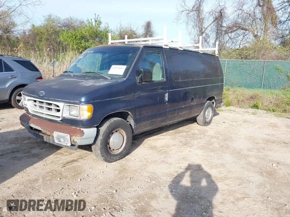 2002 Ford Econoline Cargo with VIN 1FTRE142X2HA67221, listed as a IAAI auction lot 42079493 with 180,324 mi miles. Bid and sale history available at carsss.com. Image 2.
