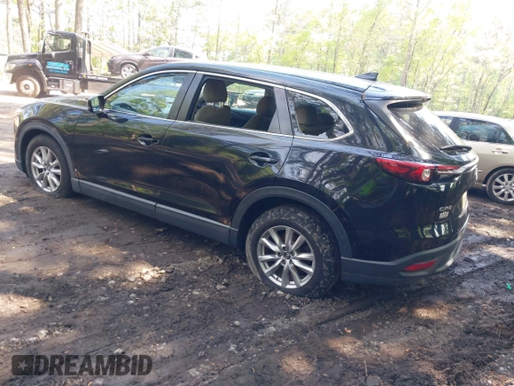 2016 Mazda CX-9 Sport with VIN JM3TCABY8G0112981, listed as a IAAI auction lot 42093389 with 106,384 mi miles. Bid and sale history available at carsss.com. Image 3.