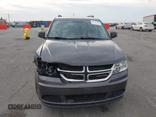 2018 Dodge Journey SE with VIN 3C4PDCABXJT170150, listed as a IAAI auction lot 40715756 with 113,330 mi miles and . Bid and sale history available at DreamBid. Image 12.