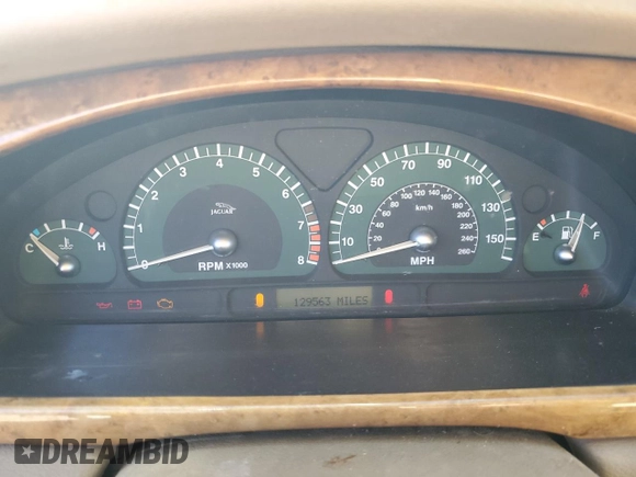 2003 Jaguar S-Type with VIN SAJEA01T93FM46260, listed as a Copart auction lot 87573835 with 129,563 mi miles and Clean Title. Bid and sale history available at DreamBid. Image 9.
