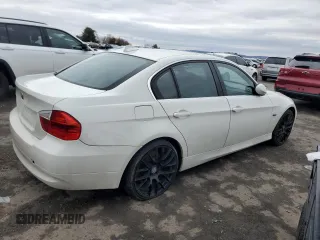 2006 BMW 3 Series 330i with VIN WBAVB33526KS32814, listed as a Copart auction lot 47785595 with 151,934 mi miles and Salvage Title. Bid and sale history available at DreamBid. Image 3.