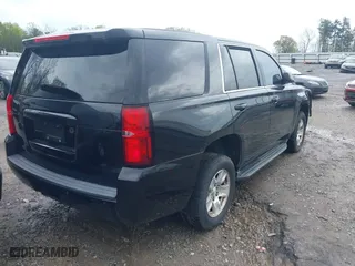2016 Chevrolet Tahoe Commercial with VIN 1GNLCDEC0GR260524, listed as a IAAI auction lot 41923506 with 247,671 mi miles. Bid and sale history available at carsss.com. Image 4.