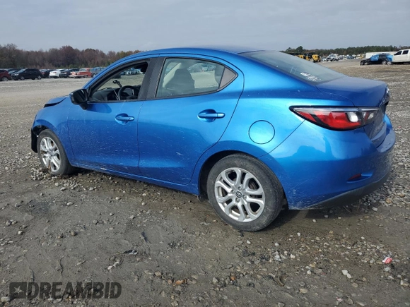 2017 Toyota Yaris iA with VIN 3MYDLBYV3HY168402, listed as a Copart auction lot 84029254 with 76,787 mi miles and Salvage Title. Bid and sale history available at carsss.com. Image 2.