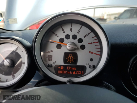 2010 MINI Convertible S with VIN WMWMS3C5XATY51076, listed as a Copart auction lot 48532735 with 104,901 mi miles and Clean title. Bid and sale history available at DreamBid. Image 9.