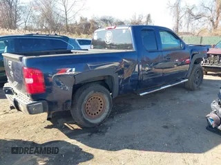 2009 Chevrolet Silverado 1500 LT with VIN 1GCEK29089Z264879, listed as a IAAI auction lot 40990010 with Not Provided miles and . Bid and sale history available at DreamBid. Image 4.