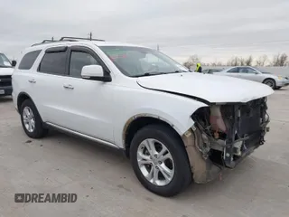 2013 Dodge Durango Crew with VIN 1C4RDHDG5DC617061, listed as a IAAI auction lot 41385801 with 142,304 mi miles. Bid and sale history available at carsss.com. Image 1.