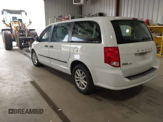 2014 Dodge Grand Caravan American Value with VIN 2C4RDGBG7ER345277, listed as a IAAI auction lot 42061355 with 145,889 mi miles and . Bid and sale history available at DreamBid. Image 3.