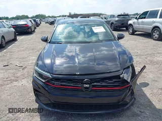 2019 Volkswagen Jetta GLI S with VIN 3VW5T7BU9KM142379, listed as a IAAI auction lot 42056617 with 77,283 mi miles and . Bid and sale history available at DreamBid. Image 12.