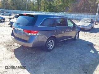 2016 Honda Odyssey EX-L with VIN 5FNRL5H69GB047902, listed as a IAAI auction lot 40795564 with 124,788 mi miles. Bid and sale history available at carsss.com. Image 4.