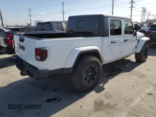 2021 Jeep Gladiator Sport S z VIN 1C6HJTAG3ML508147, wystawiony jako Copart lot #56986865 z przebiegiem 43 407 mil mil oraz Szkody całkowita. Historia ofert i sprzedaży dostępna na DreamBid. Obrazek 3.