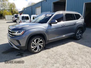 2022 Volkswagen Atlas SEL z VIN 1V2BP2CA3NC561902, wystawiony jako Copart lot #56343135 z przebiegiem 31 699 mil mil oraz Czysty tytuł • Clean title. Historia ofert i sprzedaży dostępna na DreamBid. Obrazek 1.