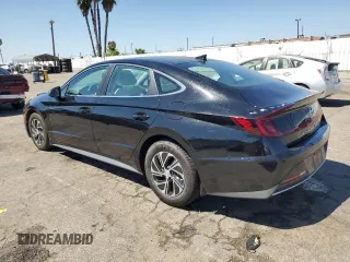 2022 Hyundai Sonata Hybrid Blue with VIN KMHL24JJ9NA041424, listed as a Copart auction lot 70693204 with 32,689 mi miles and Salvage Title. Bid and sale history available at carsss.com. Image 2.
