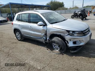 2017 Volkswagen Tiguan S with VIN WVGAV7AX1HK026998, listed as a Copart auction lot 74959504 with 93,696 mi miles and Salvage Title. Bid and sale history available at DreamBid. Image 4.