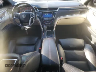 2013 Cadillac XTS Platinum z VIN 2G61V5S3XD9100843, wystawiony jako Copart lot #42943555 z przebiegiem 122 153 mil mil oraz Szkody całkowita. Historia ofert i sprzedaży dostępna na DreamBid. Obrazek 8.