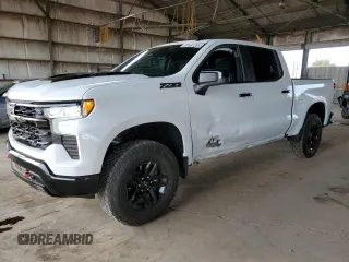 2023 Chevrolet Silverado 1500 LT Trail Boss with VIN 3GCUDFE88PG231046, listed as a Copart auction lot 87631285 with 50,893 mi miles and Salvage Title. Bid and sale history available at DreamBid. Image 1.