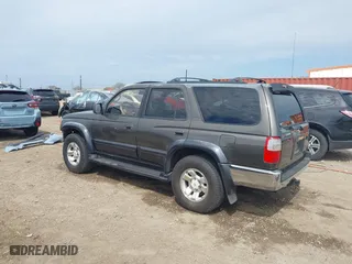 1998 Toyota 4Runner with VIN JT3GN87R9W0059225, listed as a IAAI auction lot 41669661 with 241,986 mi miles. Bid and sale history available at carsss.com. Image 3.