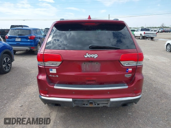 2014 Jeep Grand Cherokee Summit z VIN 1C4RJFJT4EC423217, wystawiony jako IAAI lot #42704059 z przebiegiem 245 928 mil mil oraz . Historia ofert i sprzedaży dostępna na DreamBid. Obrazek 16.