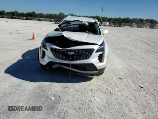 2020 Cadillac XT4 FWD Premium Luxury z VIN 1GYFZCR48LF128683, wystawiony jako Copart lot #82842694 z przebiegiem Nie podano mil oraz Szkoda całkowita • Salvage title. Historia ofert i sprzedaży dostępna na DreamBid. Obrazek 11.