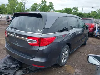 2018 Honda Odyssey EX-L z VIN 5FNRL6H74JB043276, wystawiony jako IAAI lot #42326742 z przebiegiem 126 025 mil mil oraz . Historia ofert i sprzedaży dostępna na DreamBid. Obrazek 4.