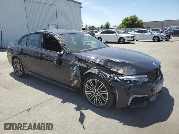 2019 BMW 5 Series M550i xDrive with VIN WBAJB9C5XKB287877, listed as a Copart auction lot 52994065 with 52,460 mi miles and Salvage title. Bid and sale history available at DreamBid. Image 4.
