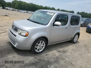 2010 Nissan Cube S z VIN JN8AZ2KRXAT163809, wystawiony jako Copart lot #59946555 z przebiegiem 135 776 mil mil oraz Szkoda całkowita • Salvage title. Historia ofert i sprzedaży dostępna na DreamBid. Obrazek 1.