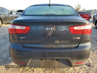 2014 Kia Rio EX with VIN KNADN4A39E6325590, listed as a Copart auction lot 71774344 with 90,785 mi miles and Salvage Title. Bid and sale history available at carsss.com. Image 6.