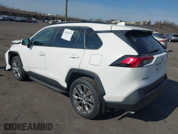 2019 Toyota RAV4 XLE Premium with VIN JTMA1RFV9KD013771, listed as a IAAI auction lot 42055558 with 36,585 mi miles. Bid and sale history available at carsss.com. Image 3.
